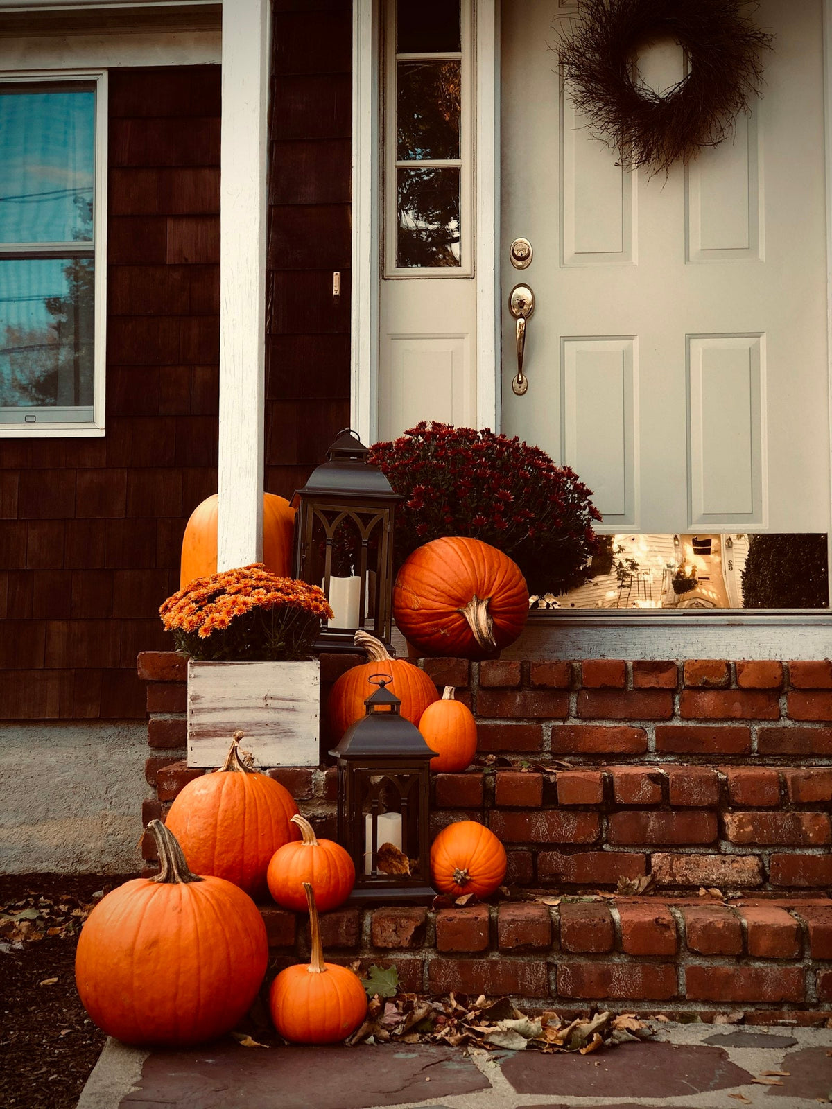 Pumpkins on porch stairs